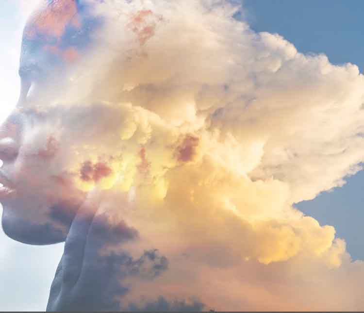 A cloud formation with the sun shining through.